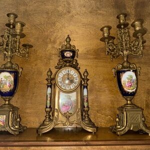 IMPERIAL ITALIAN THREE-PIECE GILT METAL AND PORCELAIN GARNITURE SET